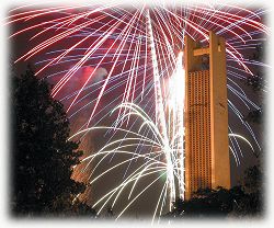 fireworks behind Smith Tower